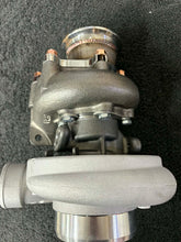 Load image into Gallery viewer, SPTHX5455-.63A/R HX30/35 Turbocharger TD42
